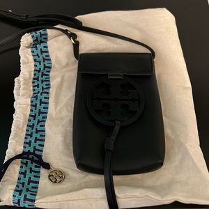 Black Tory Burch phone holder.